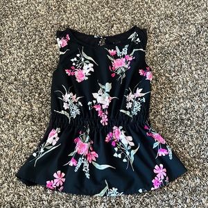 Peplum sleeveless top